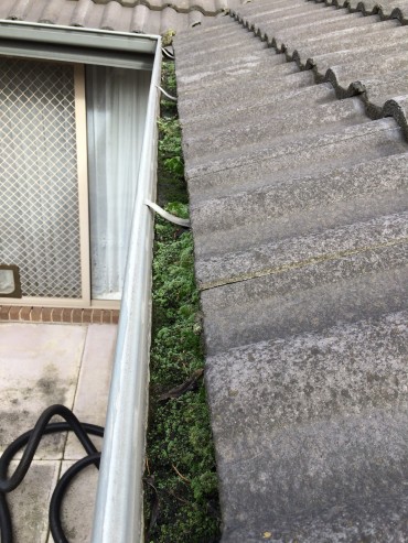 BEFORE - GUTTER CLEANING